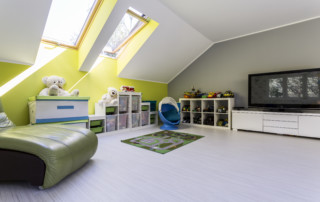 Child Room At The Attic With Tv Set